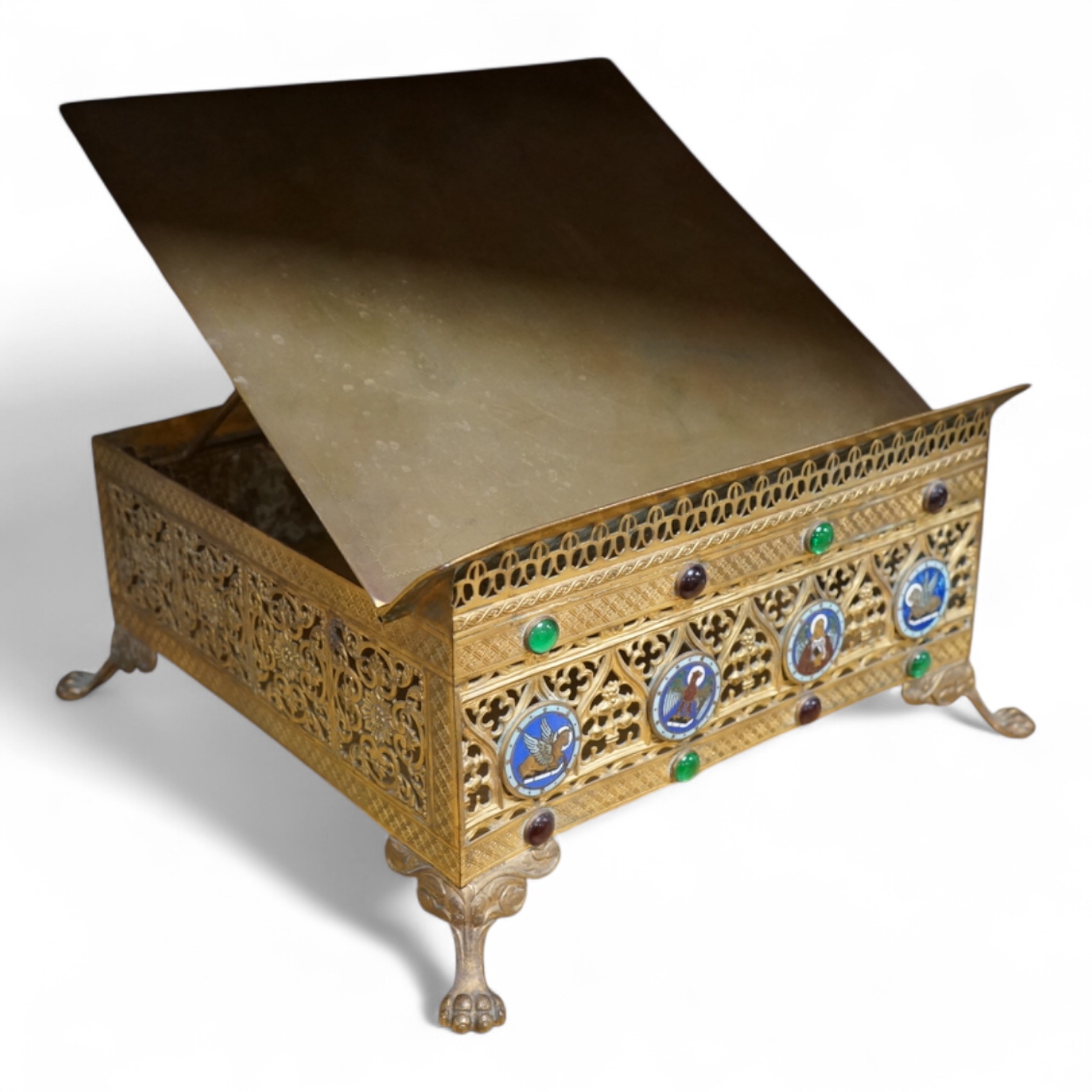 A French Limoges enamel and gilt metal lectern stand with glass cabochons and paw feet, 30cm wide